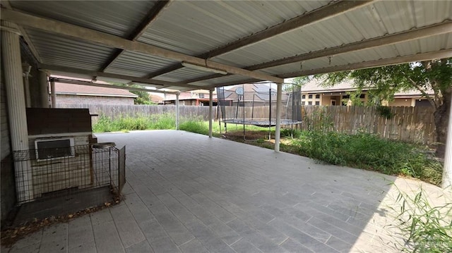 2216 N 48th St, Mcallen, TX 78501 - view of patio featuring a fenced backyard and a trampoline