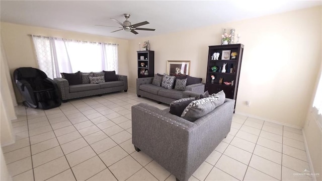 2216 N 48th St, Mcallen, TX 78501 - living room with a ceiling fan, baseboards, and light tile patterned floors
