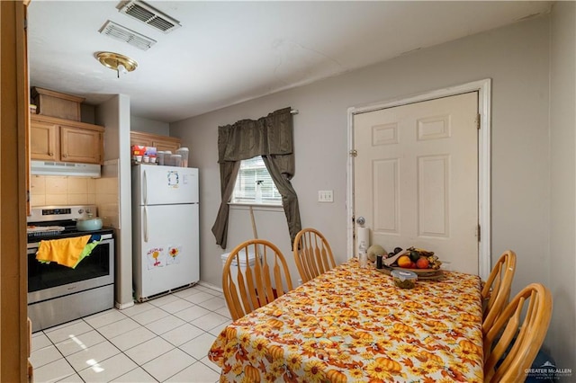 dining room with light tile patterned floors