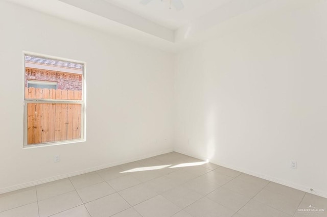 empty room featuring baseboards