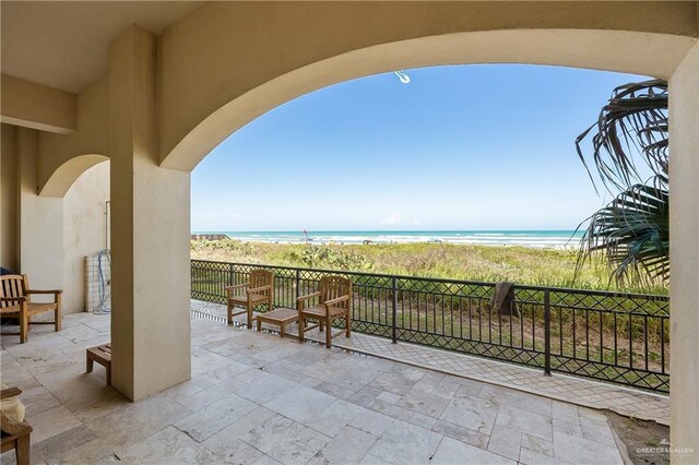 4616 Gulf Blvd S, Unit South, South Padre Island, TX 78597 - view of patio / terrace featuring view of water and beach