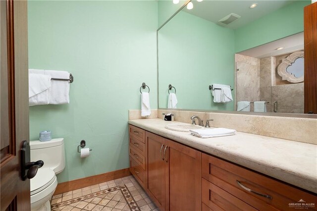 4616 Gulf Blvd S, Unit South, South Padre Island, TX 78597 - full bath featuring vanity, tile patterned flooring, toilet, baseboards, and an enclosed shower