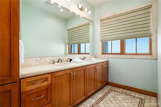 4616 Gulf Blvd S, Unit South, South Padre Island, TX 78597 - full bathroom featuring double vanity and tile patterned floors
