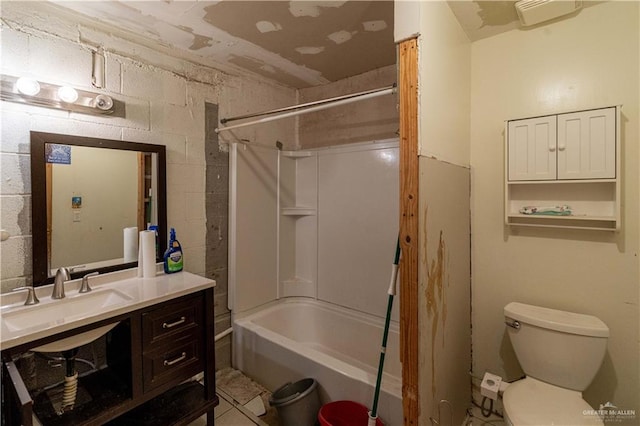 full bathroom featuring tile patterned flooring, vanity, toilet, and shower / washtub combination