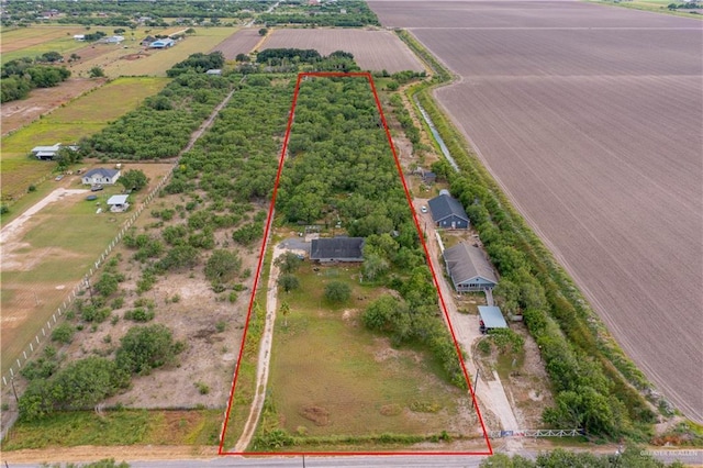 2421 W Mile 13 1/2 N, Weslaco, TX 78599 - aerial view of sparsely populated area with property boundaries highlighted and extensive farmland