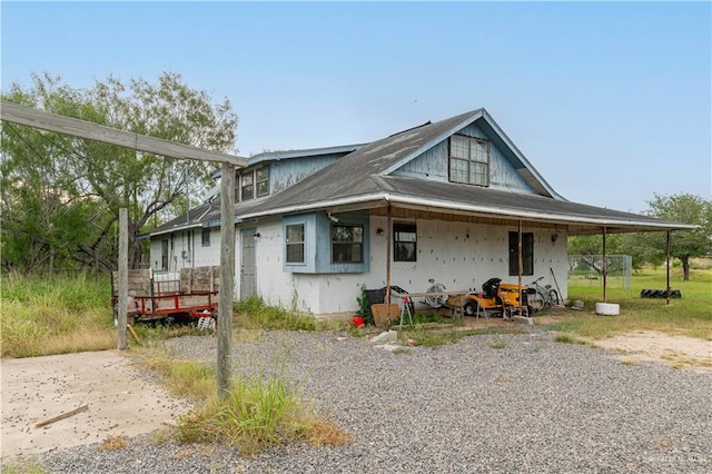 view of front of property with a carport