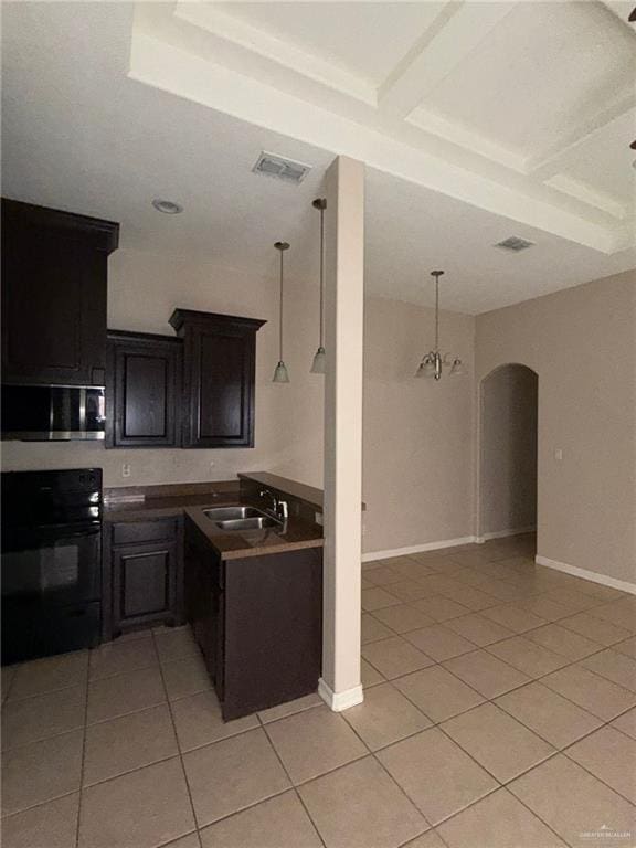 kitchen featuring decorative light fixtures, sink, an inviting chandelier, black electric range oven, and light tile patterned floors