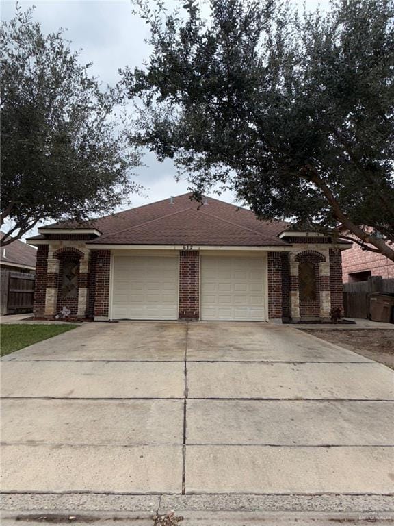 view of front of home with a garage