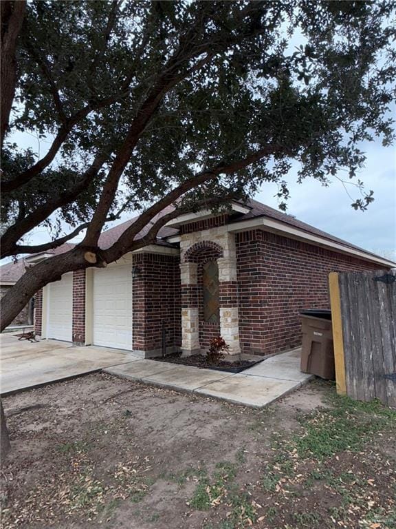 view of front of property with a garage