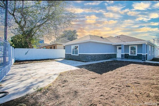 view of front of home with a patio area