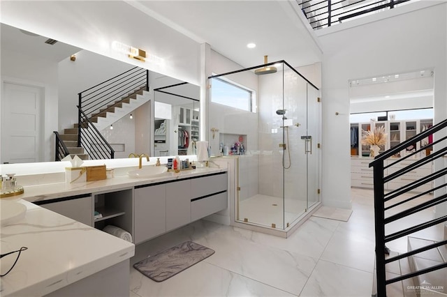 bathroom featuring vanity and walk in shower