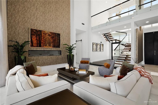 living room with a high ceiling