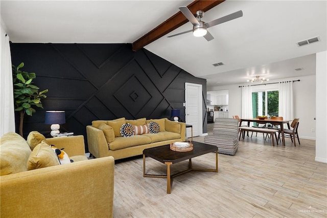 5824 N 23rd Ln, Mcallen, TX 78504 - living area with baseboards, a ceiling fan, light wood-style flooring, and a chandelier