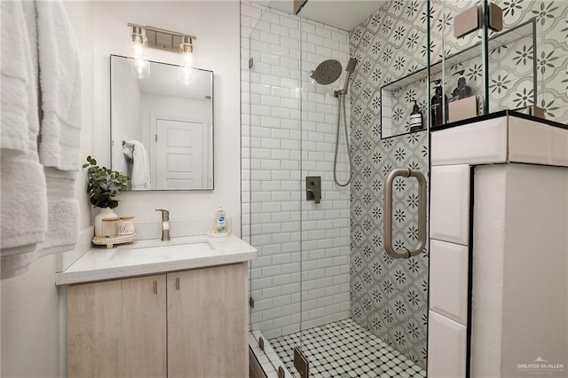 5824 N 23rd Ln, Mcallen, TX 78504 - bathroom featuring a stall shower and vanity