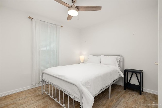 5824 N 23rd Ln, Mcallen, TX 78504 - bedroom featuring wood finished floors, baseboards, and ceiling fan