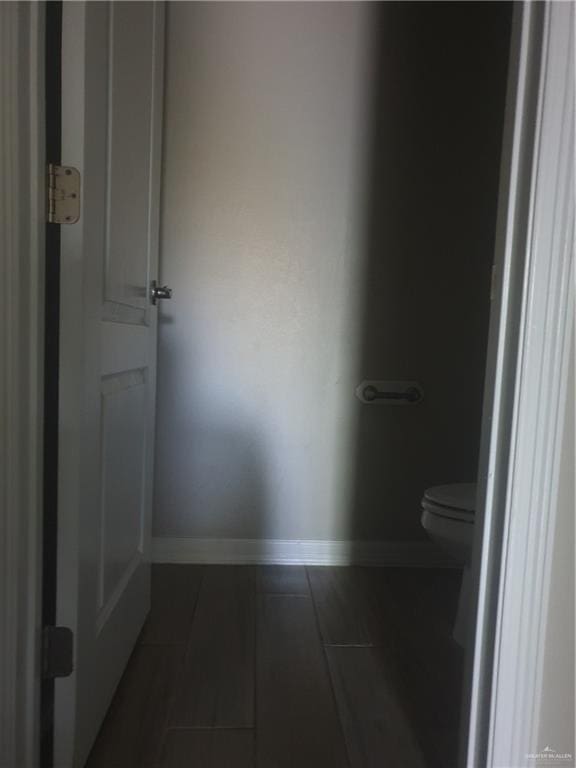 7612 N 40th St, Mcallen, TX 78504 - bathroom with tile patterned floors, toilet, and baseboards