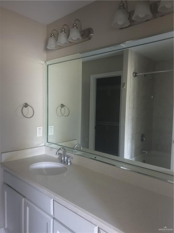 7612 N 40th St, Mcallen, TX 78504 - bathroom with tub / shower combination and vanity