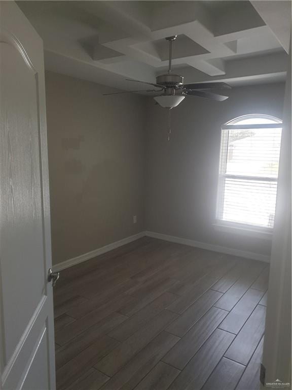 7612 N 40th St, Mcallen, TX 78504 - spare room featuring a ceiling fan, coffered ceiling, dark wood-type flooring, baseboards, and beam ceiling