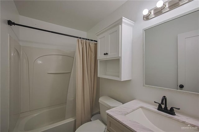 full bathroom featuring vanity, shower / bath combo, and toilet