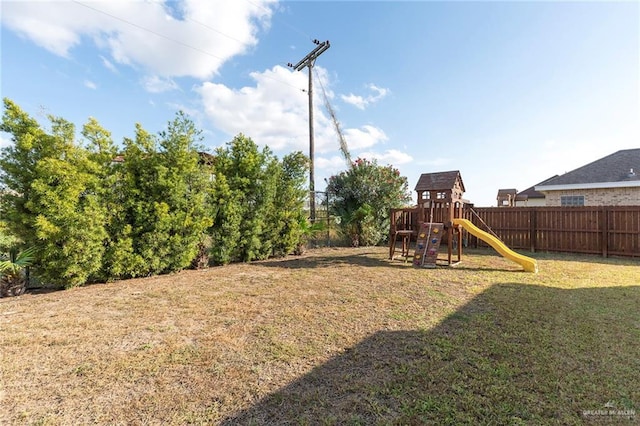 view of yard with a playground