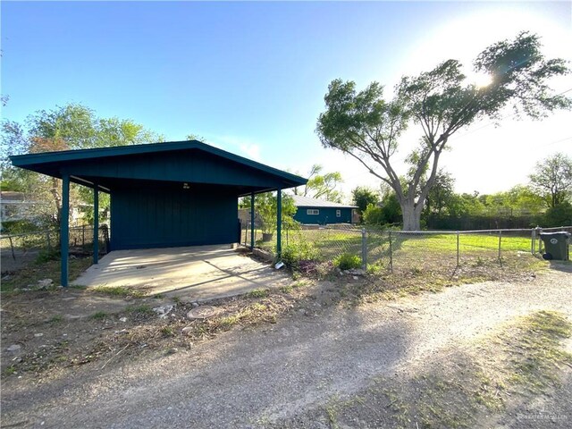 1005 Bryce Dr, Mission, TX 78572 - view of side of home featuring fence