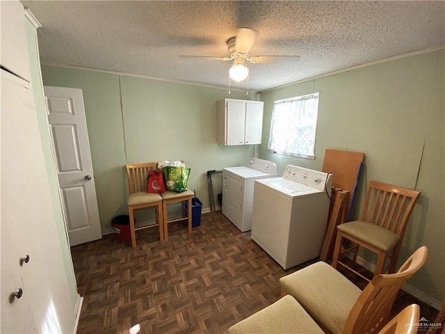 1005 Bryce Dr, Mission, TX 78572 - laundry area featuring washer and dryer, a ceiling fan, cabinet space, a textured ceiling, and baseboards