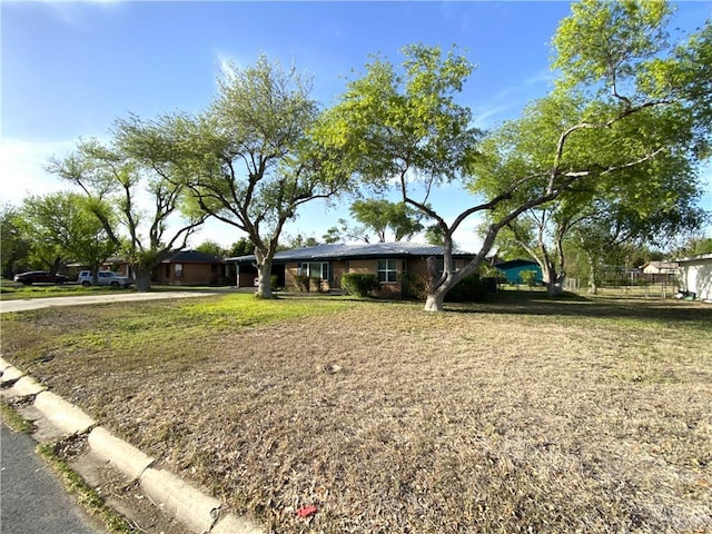 1005 Bryce Dr, Mission, TX 78572 - ranch-style home featuring a front yard