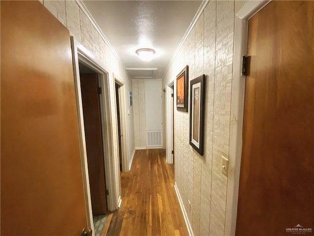 1005 Bryce Dr, Mission, TX 78572 - hallway with wood finished floors and crown molding