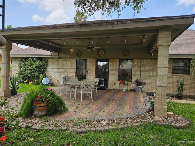 view of patio with ceiling fan