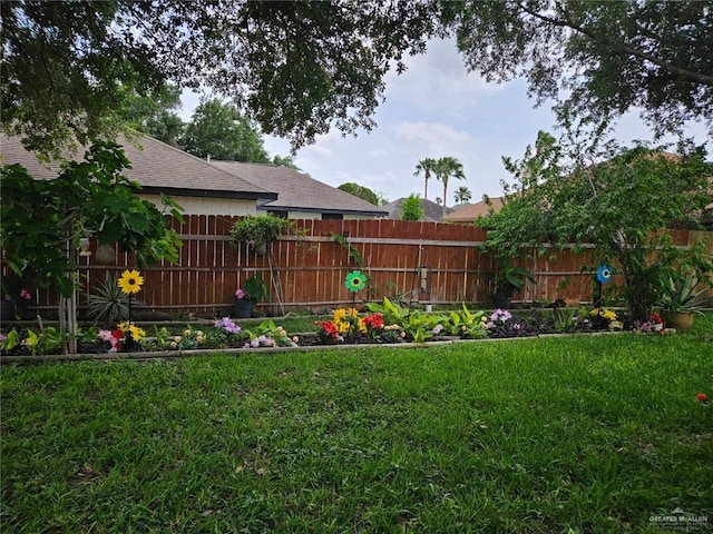 view of yard with fence