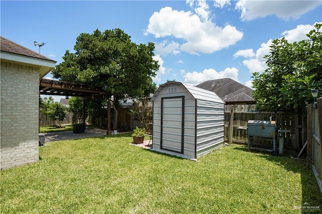 view of outbuilding featuring a lawn and a pergola