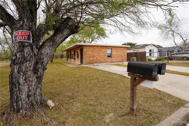 exterior space with a lawn