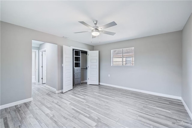 406 N Fairgrounds Rd, Rio Grande City, TX 78582 - unfurnished bedroom featuring baseboards, light wood-style floors, a closet, and a ceiling fan