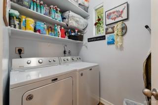 2105 Treasure Oaks Dr, Harlingen, TX 78550 - washroom with separate washer and dryer
