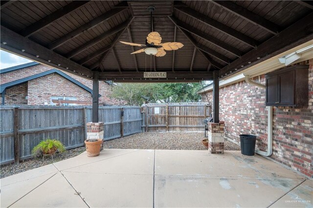 view of patio / terrace featuring a gazebo and ceiling fan