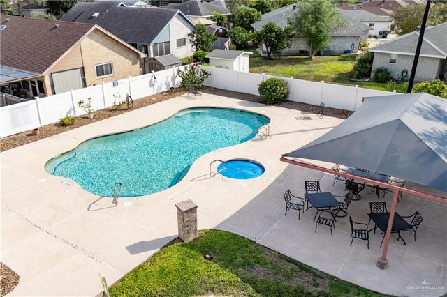 view of pool with a patio area