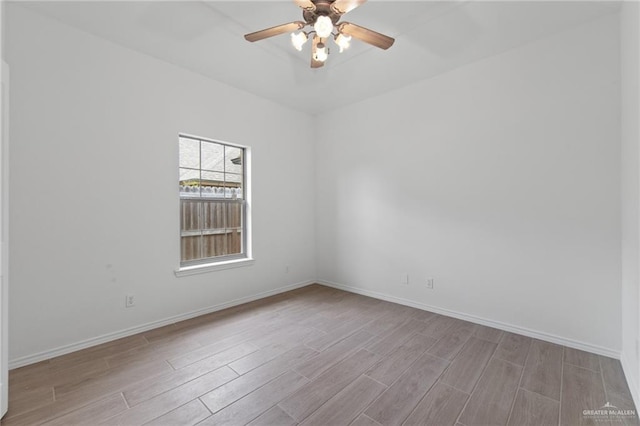 2605 Jeff St, Harlingen, TX 78550 - unfurnished room featuring wood finished floors, baseboards, and ceiling fan