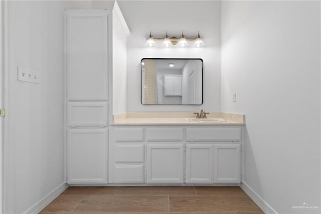 2605 Jeff St, Harlingen, TX 78550 - bathroom featuring vanity and baseboards