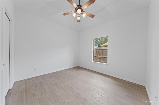 2605 Jeff St, Harlingen, TX 78550 - spare room featuring light wood-style flooring, a ceiling fan, and baseboards
