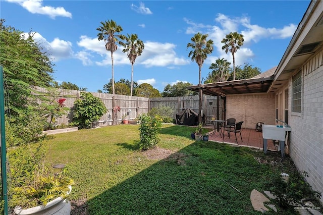 view of yard with a patio
