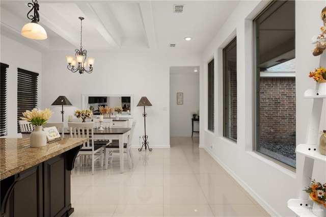 tiled dining area featuring beamed ceiling and a notable chandelier