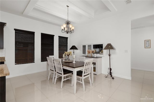 tiled dining space featuring beam ceiling and a chandelier