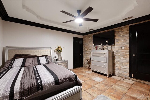 bedroom featuring a ceiling fan, visible vents, and crown molding