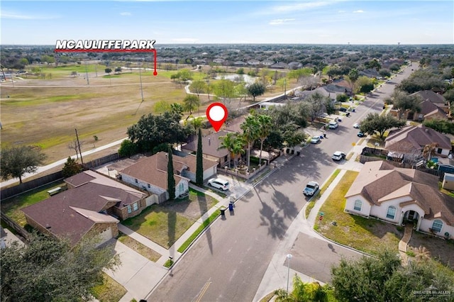 birds eye view of property with a residential view