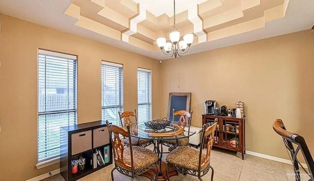 3104 Cactus Dr, Weslaco, TX 78599 - dining space with a chandelier, plenty of natural light, coffered ceiling, baseboards, and light tile patterned flooring