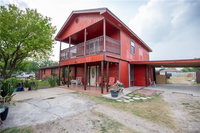 3008 W 45th St, Mission, TX 78574 - back of house with a balcony
