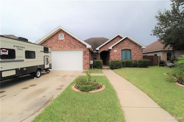 view of front facade featuring a front lawn and a garage