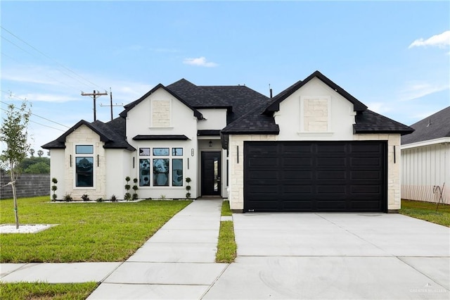 modern farmhouse with a front yard, driveway, a garage, and roof with shingles