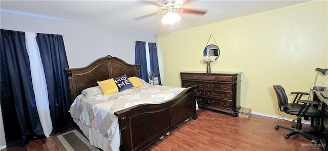 2409 Palmetto Dr Unit 48, Mission, TX 78574 - bedroom with wood finished floors and ceiling fan