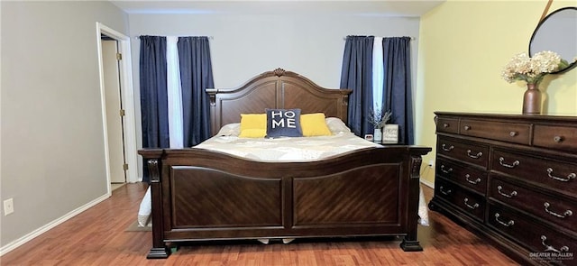 2409 Palmetto Dr Unit 48, Mission, TX 78574 - bedroom featuring wood finished floors